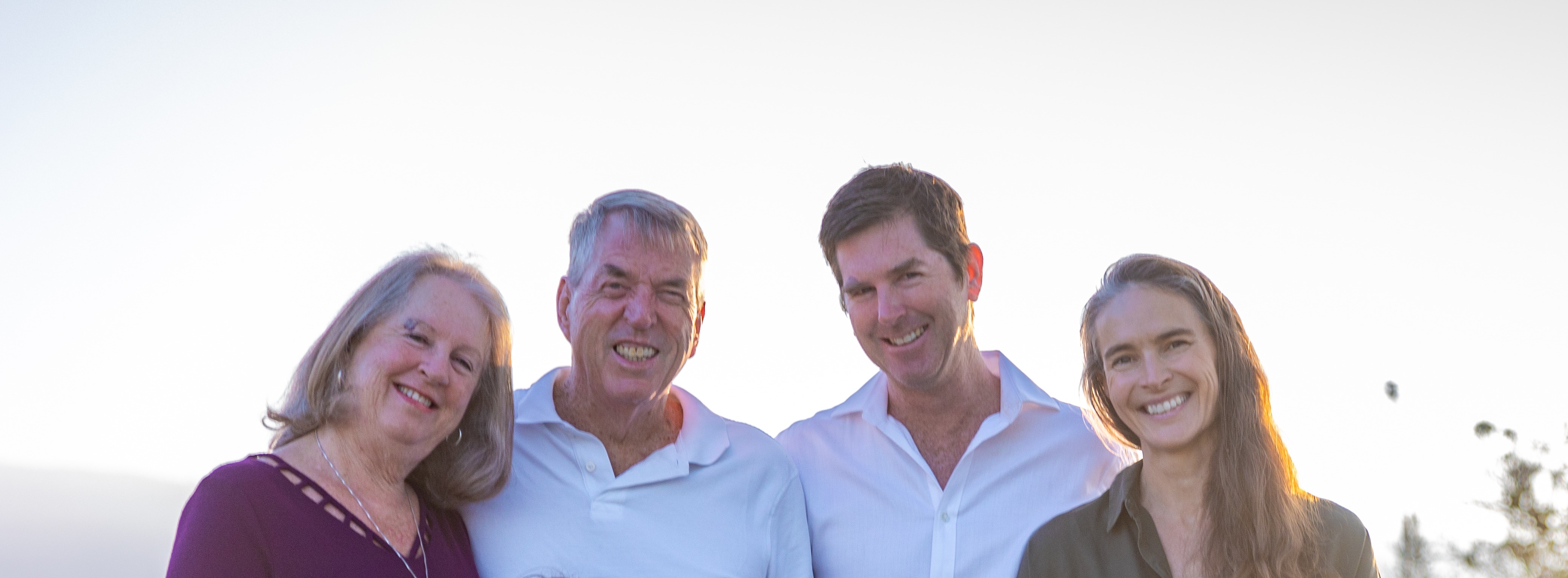 Margie, Don, Andrew, and Karla standing together — the Hands on Houses team